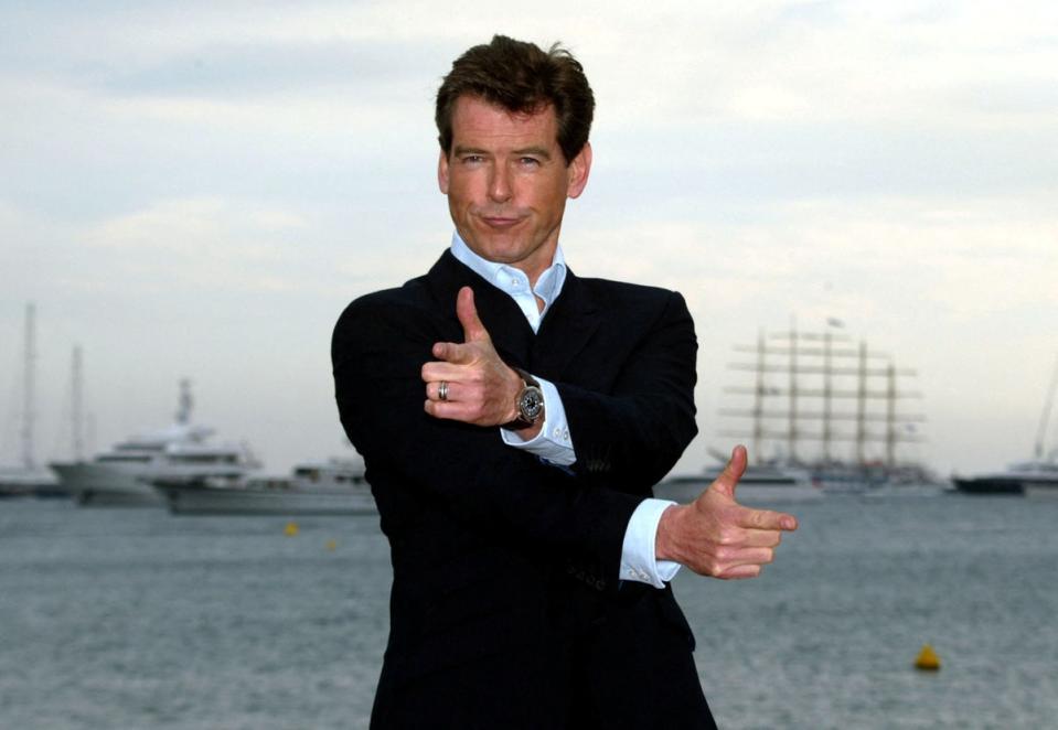 Pierce Brosnan poses as he promotes the James Bond film ‘Die Another Day’ at the 55th Cannes on 18 May 2002 (Reuters)