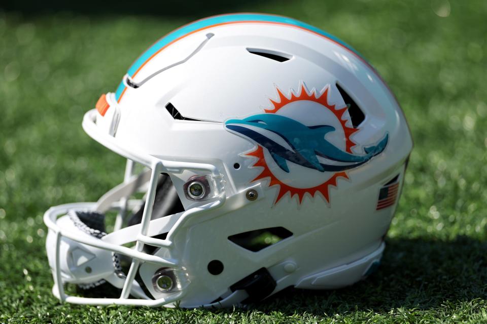 BALTIMORE, MARYLAND - SEPTEMBER 18: A detailed view of a Miami Dolphins helmet before a game against the Baltimore Ravens at M&T Bank Stadium on September 18, 2022 in Baltimore, Maryland. (Photo by Patrick Smith/Getty Images)