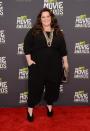 After more than a couple of red carpet disasters 'Identity Thief' star Melissa McCarthy gets it right in this simple black tunic and trouser combo.