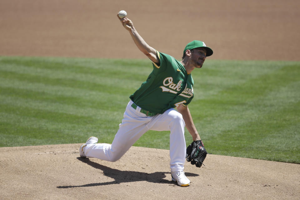 Oakland Athletics pitcher Chris Bassitt works against the Los Angeles Angels in the first inning of a baseball game Monday, July 27, 2020, in Oakland, Calif. (AP Photo/Ben Margot)