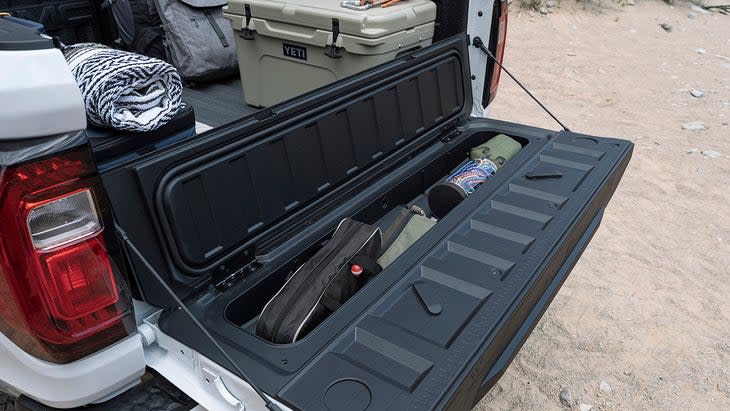 <span class="article__caption">The standard storage compartment in the tailgate is waterproof, and should be the perfect, accessible spot to store recovery gear. (Photo: GMC)</span>