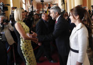 Ivanka Trump, President Donald Trump's daughter and White House adviser, left, is received by Paraguay's President Mario Abdo Benitez and his wife Silvana Lopez Moreira, at the Presidential Palace in Asuncion, Paraguay, Friday, Sept. 6, 2019. Ivanka Trump is on her third stop of a South American trip to promote women's empowerment. (AP Photo/Jorge Saenz)