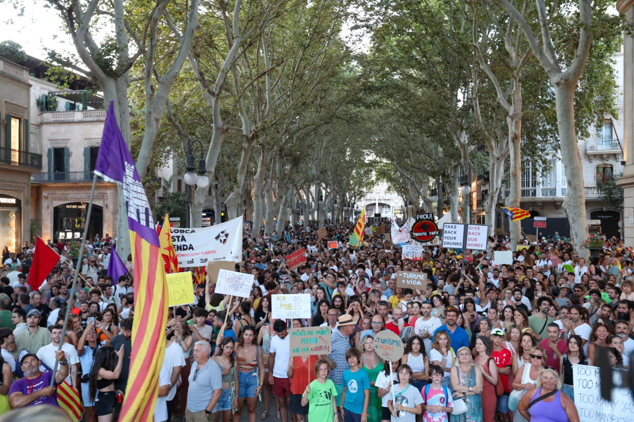 MALLORCA, PALMA DE MALLORCA, BAL, SPAIN - JULY 21: Dozens of people during an anti-tourism demonstration in the Parc de ses Estacions, on 21 July, 2024 in Mallorca, Palma de Mallorca, Balearic Islands, Spain. The platform 'Menys Turisme, Mes Vida' has encouraged citizens to mobilize today, in the city of Palma, to 