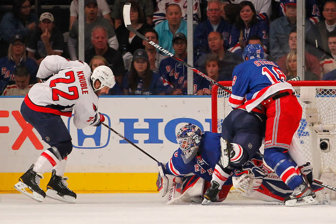   Mike Knuble #22 Of The Washington Capitals Attempts A Shot Against Goalie Henrik Lundqvist #30 Of The New York Getty Images