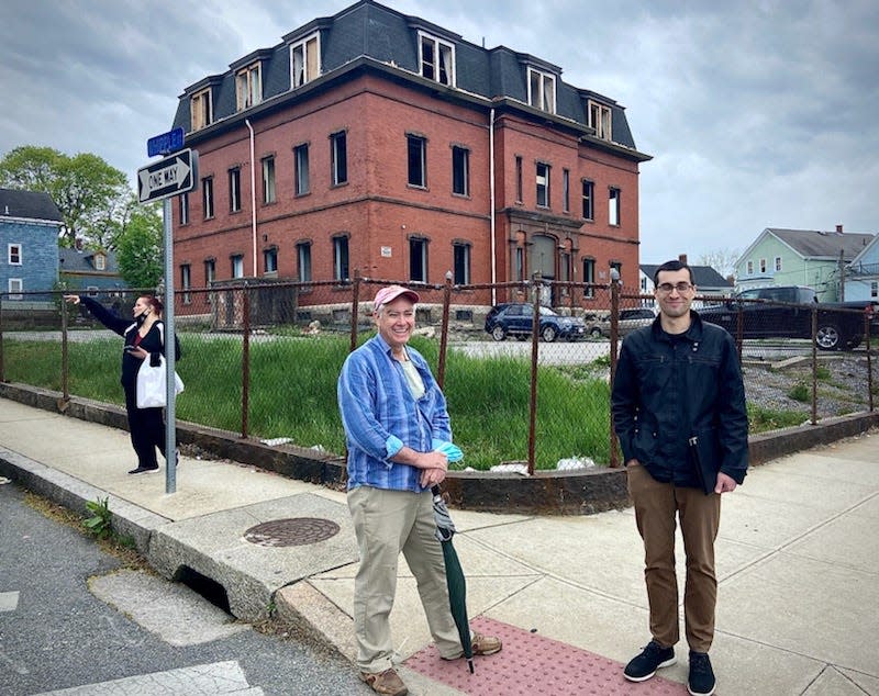 Fall River Preservation Society board president James Soule and clerk Alex Silva are seen here in front of the former N.B Borden School on Morgan Street.