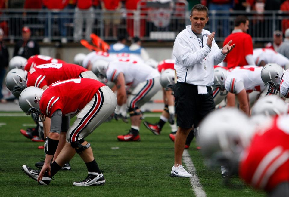 OSU head football coach Urban Meyer watches the team before the first half of their game at Ohio Stadium in Columbus, Ohio on April 21, 2012. (Columbus Dispatch photo by Brooke LaValley)