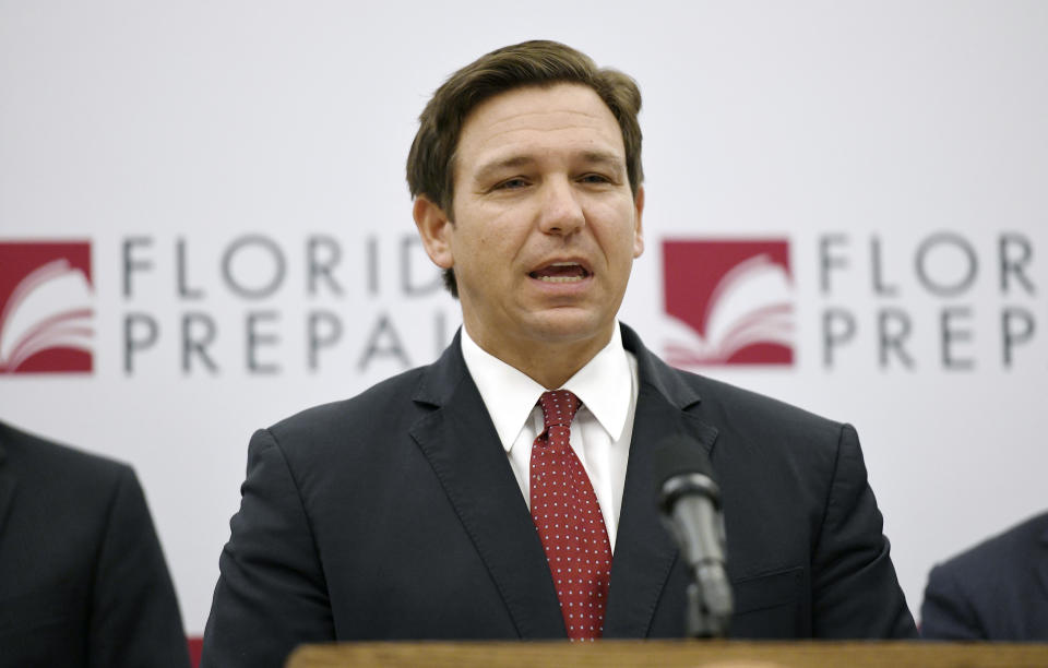 Florida Gov. Ron DeSantis announces that there would be refunds coming to families that have been paying into the Florida Prepaid tuition plan since 2008 and a reduction in the costs for new enrollments during a press conference in Jacksonville, Fla., Monday, Jan. 13, 2020. (Bob Self/The Florida Times-Union via AP)