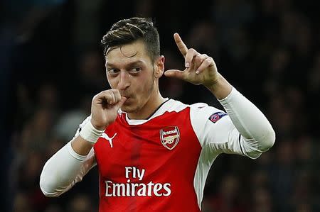 Britain Football Soccer - Arsenal v PFC Ludogorets Razgrad - UEFA Champions League Group Stage - Group A - Emirates Stadium, London, England - 19/10/16 Arsenal's Mesut Ozil celebrates scoring their sixth goal and his hat trick Action Images via Reuters / Andrew Couldridge Livepic