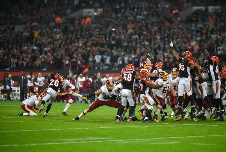 Oct 30, 2016; London, United Kingdom; Washington Redskins placekicker Dustin Hopkins (3) misses a field goal in overtime during the game between the Cincinnati Bengals and the Redskins at Wembley Stadium. Mandatory Credit: Steve Flynn-USA TODAY Sports