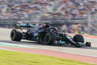 Mercedes driver Lewis Hamilton, of Britain, steers through a turn during practice for the Formula One U.S. Grand Prix auto race at the Circuit of the Americas, Friday, Oct. 22, 2021, in Austin, Texas. (AP Photo/Eric Gay)