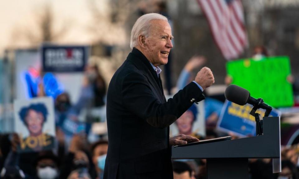 President- elect Joe Biden campaigns for Democratic Senate candidates Jon Ossoff and Raphael Warnock at in Atlanta, Georgia, on Monday.