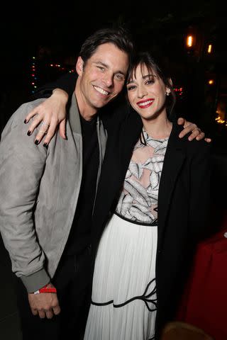 <p>Eric Charbonneau/Invision for Sony PIctures/AP Images</p> James Marsden and Lizzy Caplan in 2015