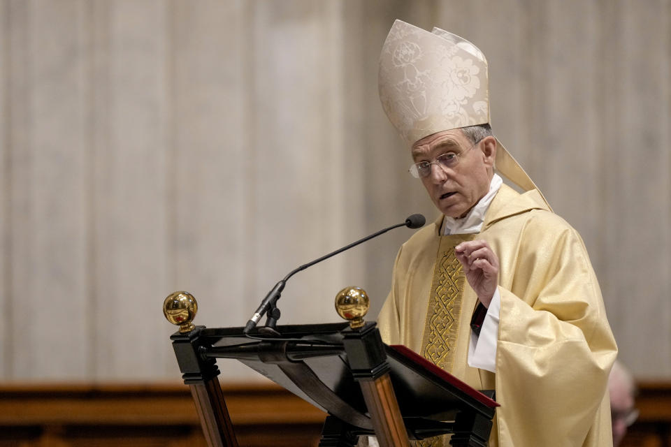 Secretary of former Pope Benedict XVI, Archbishop Georg Gaenswein delivers his speech as he holds a mass to mark a one year anniversary of the death of Pope Benedict, in St. Peter's Basilica, the Vatican, Sunday, Dec. 31, 2023. Gaenswein has been the former private secretary to Pope Benedict XVI for many years until his death on Dec. 31, 2022. (AP Photo/Andrew Medichini)