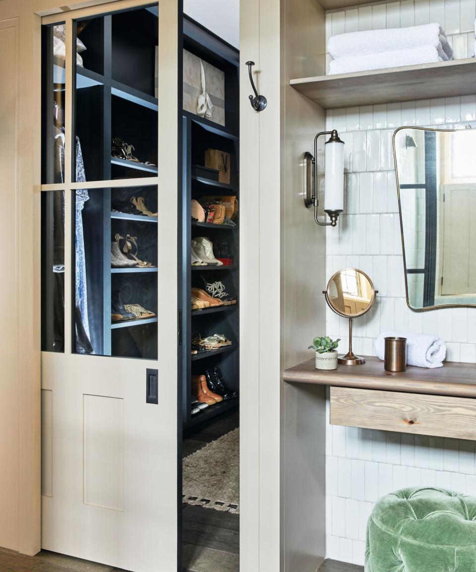 Bathroom dressing room with sliding door to hide dressing room