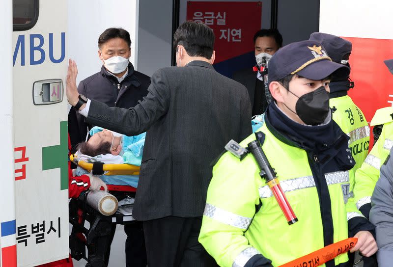 FILE PHOTO: South Korea's opposition Democratic Party leader Lee Jae-myung arrives at Seoul National University Hospital after being stabbed in the neck during his visit to Busan, in Seoul