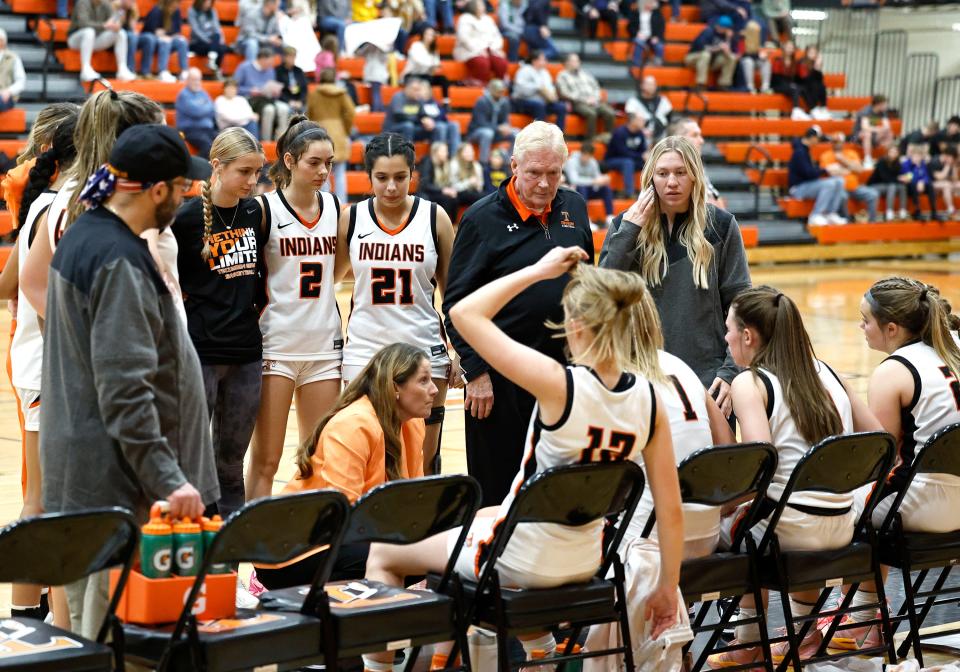 Tecumseh head coach Kristy Zajac talks to her team in a timeout during a game against Chelsea.