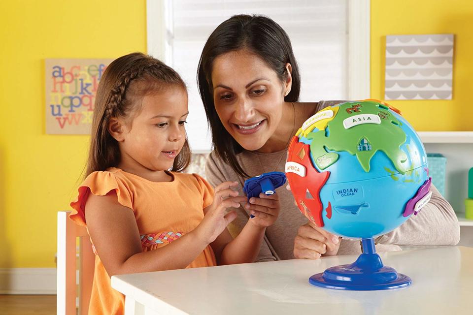 Tiny tots will love playing with the spinning globe. (Photo: Amazon)