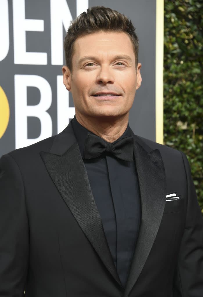 Ryan Seacrest has been cleared of sexual misconduct allegations against him by E!, but his accuser, Suzie Hardy, says she isn’t backing down. (Photo: Valerie Macon/AFP/Getty Images)