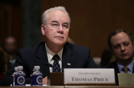 FILE PHOTO - U.S. Rep. Tom Price (R-GA) listens to opening remarks prior to testifying before a Senate Finance Committee confirmation hearing on his nomination to be Health and Human Services secretary on Capitol Hill in Washington, U.S. on January 24, 2017. REUTERS/Carlos Barria/File Photo