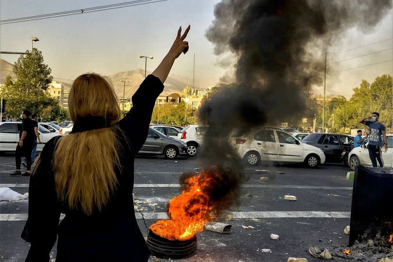 FILE - ranians protests the death of 22-year-old Mahsa Amini after she was detained by the morality police, in Tehran, Oct. 1, 2022.