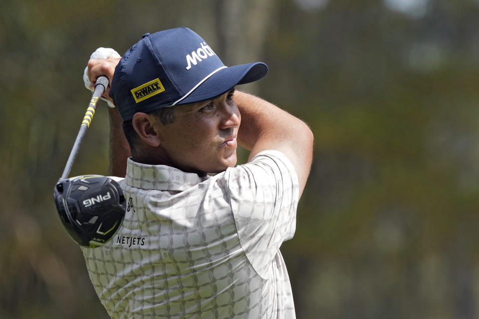 Jason Day, of Australia, hits his tee shot on the second hole during the third round of The Players Championship golf tournament Saturday, March 16, 2024, in Ponte Vedra Beach, Fla. (AP Photo/Lynne Sladky)