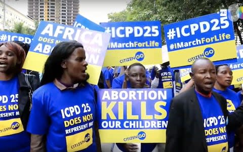 A group of anti-abortion protesters gathered outside the conference centre on Monday - Credit: Screenshot from AGENCIA EFE/Daniel Irungu youtube video