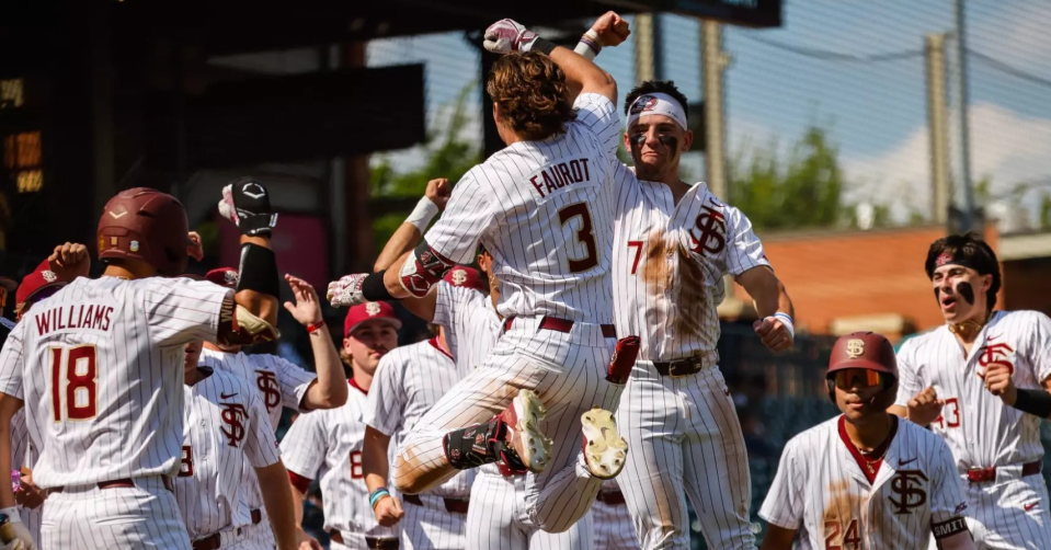 Drew Faurot celebrates with his FSU baseball teammates after hitting a homerun. FSU beat Georgia Tech, 12-9 in the opening round of the ACC Championship.