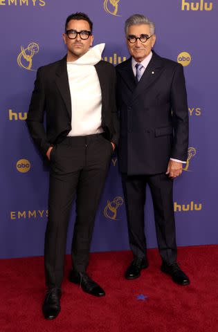 <p>Kevin Mazur/Getty</p> Dan Levy and Eugene Levy