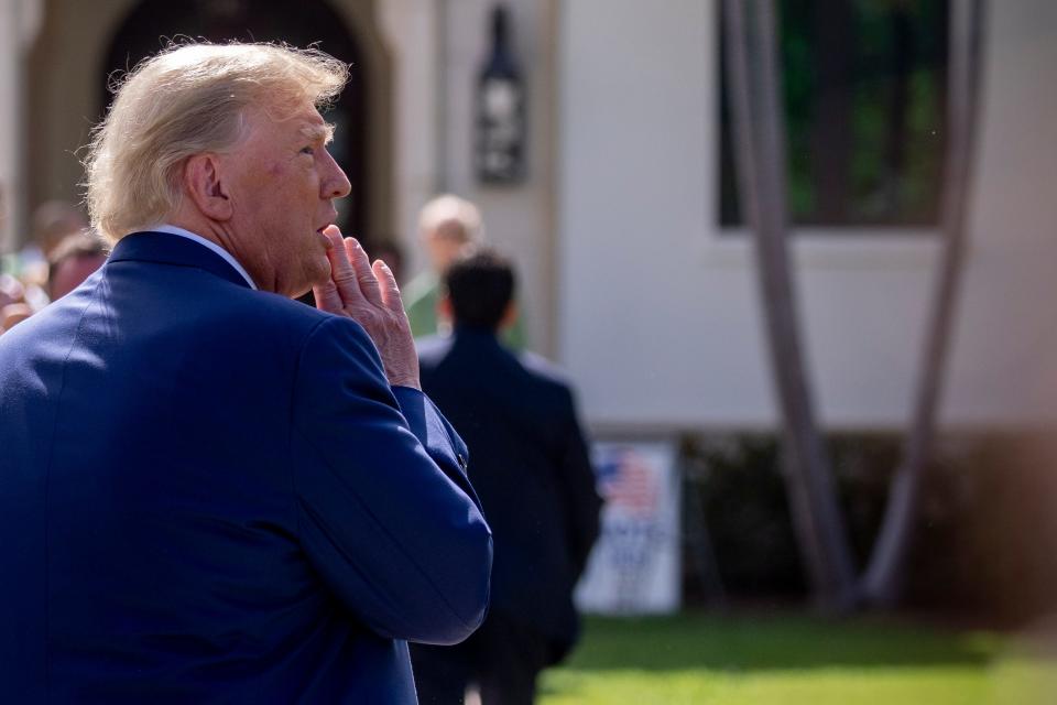 Former President Donald Trump speaks to members of the media outside Morton and Barbara Mandel Recreation Center after voting on Election Day, Tuesday, Nov. 8, 2022, in Palm Beach, Fla. (AP Photo/Andrew Harnik) ORG XMIT: OTKAH