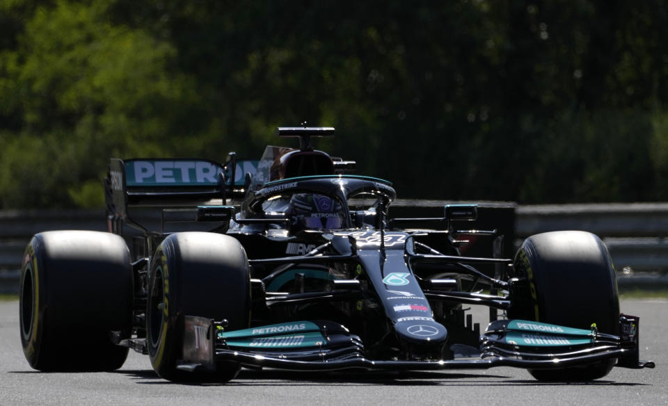 Mercedes driver Lewis Hamilton of Britain steers his car during the second free practice at the Hungaroring racetrack in Mogyorod, Hungary, Friday, July 30, 2021. The Hungarian Formula One Grand Prix will be held on Sunday. (AP Photo/Darko Bandic)