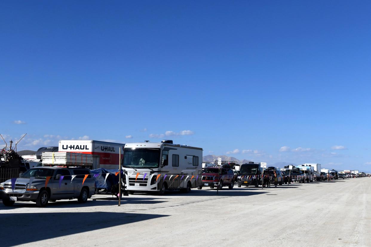 Vehicles line up to leave the Burning Man festival in Black Rock Desert, Nev., Tuesday, Sept. 5, 2023. (AP)