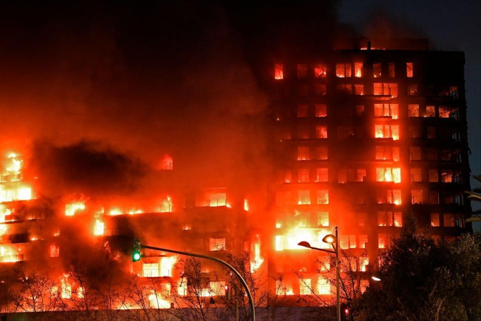 The fire ripped through a multi-storey residential block (AFP via Getty Images)