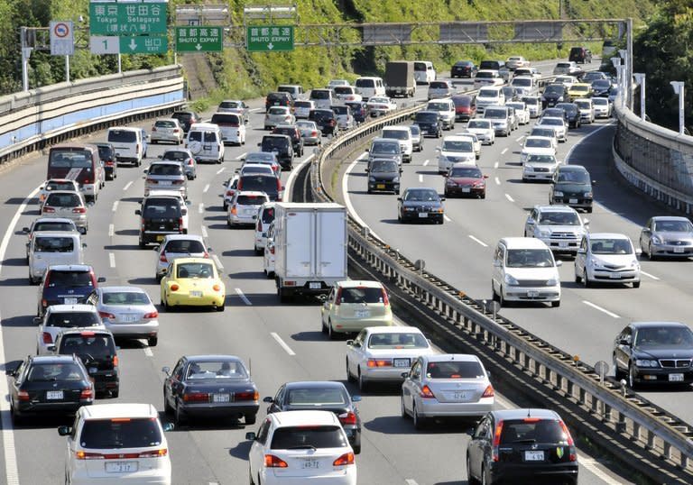 File photo shows motorists being caught in a traffic jam along a highway in Tokyo, on September 20, 2009. Up to 3.39 million vehicles made by major Japanese manufacturers will be recalled worldwide because of possible problems with airbags, a government official said on Thursday