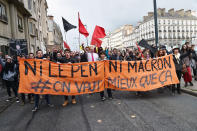 <p>Protesters hold a banner reading “Neither Le Pen nor Macron” on April 27, 2017 in Rennes, western France during a demonstration to protest against the results of the first round of the French presidential election. (Jean-Francois Monier/AFP/Getty Images) </p>