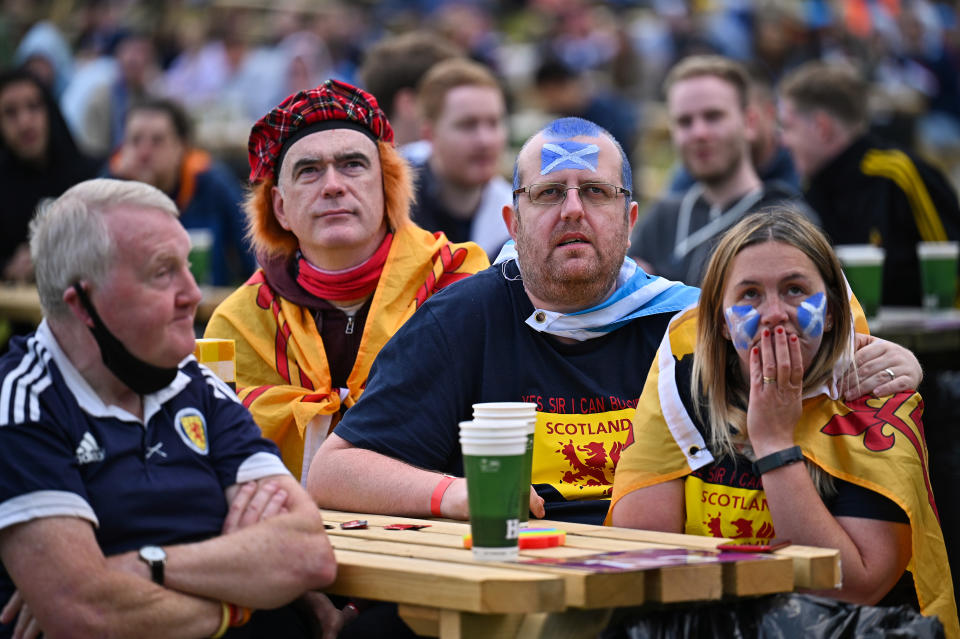 Smiles were absent as Scotland fans saw their hopes of progressing dashed.