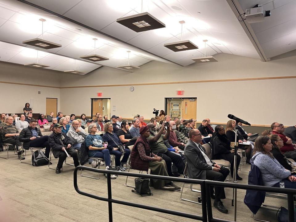 Citizens gathered at Peoria Public Library to voice their concerns about proposed changes to the Peoria United States Postal Service.