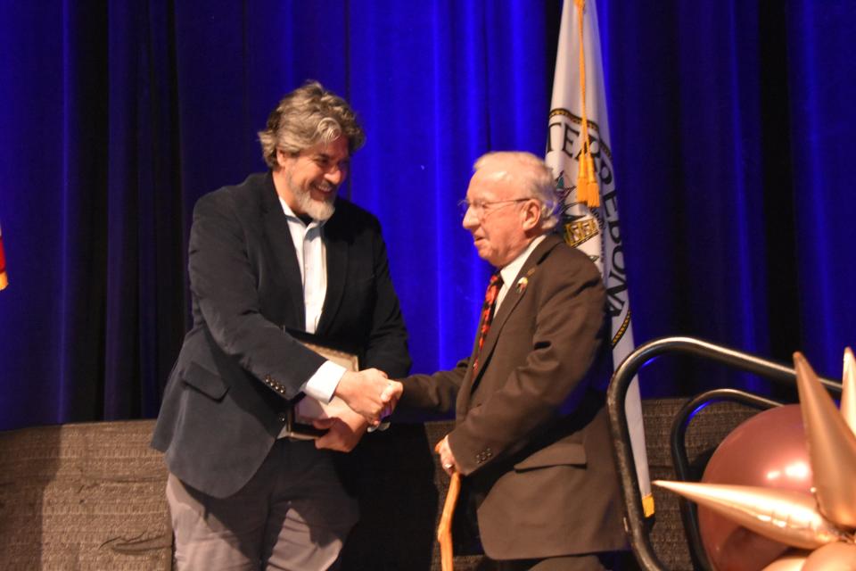 2022 Courier's Most Useful Citizen Award recipient Johnathan Foret presents the 2023 Most Useful Citizen Award to Kirby Verret during the 94th Annual Houma-Terrebonne Chamber of Commerce Banquet, Tuesday, January 30.