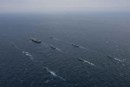 The aircraft carrier USS Ronald Reagan and the Arleigh Burke-class destroyer USS Stethem are underway alongside ships from the Republic of Korea (ROK) Navy in the waters east of the Korean Peninsula on October 18, 2017. Courtesy Kenneth Abbate/U.S. Navy/Handout via REUTERS
