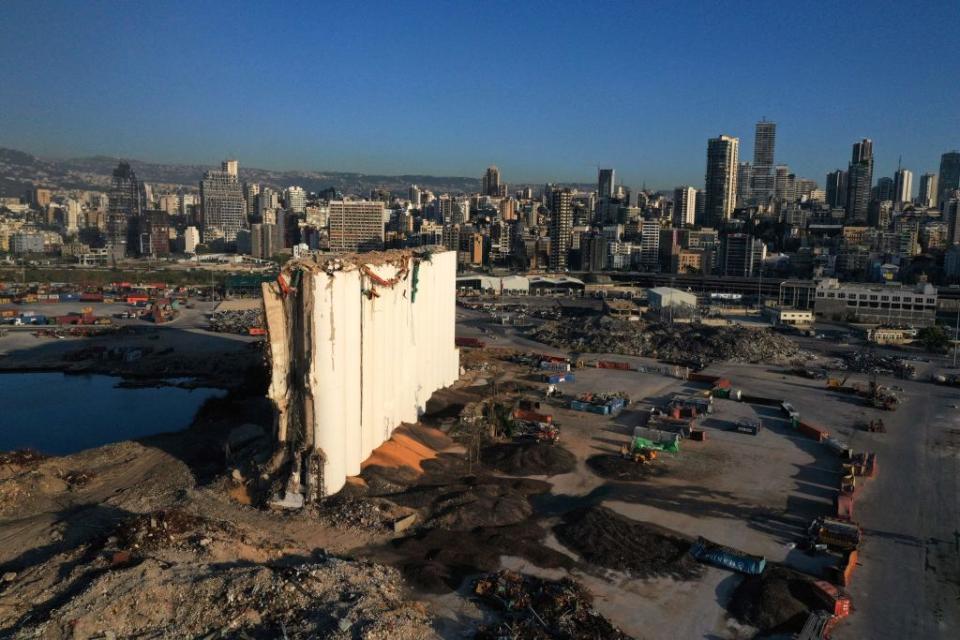 An areal view shows Beirut port on May 27, 2021, with the grain silos in the foreground, damaged in a massive explosion on August 4 of last year.