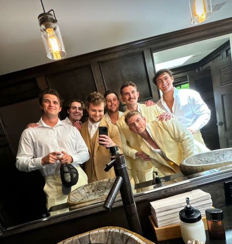 <p>Alex Warren/Instagram</p> Alex Warren and members of the wedding party