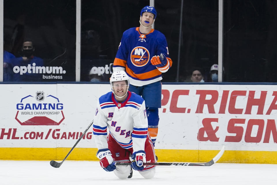 New York Islanders Matt Martin (17) reacts to a penalty called on him involving New York Rangers' Kevin Rooney (17) during the second period of an NHL hockey game Sunday, April 11, 2021, in Uniondale, N.Y. (AP Photo/Frank Franklin II)