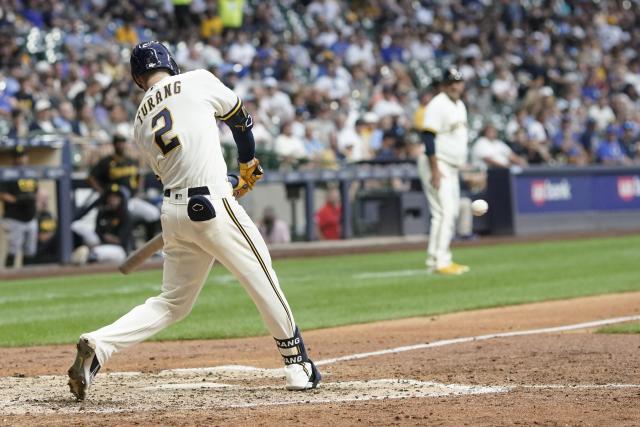 Milwaukee Brewers' Sal Frelick reacts as he walks back to the