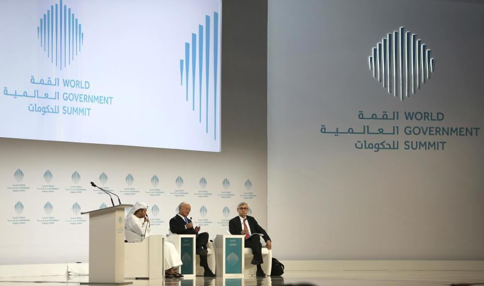 Director General of the International Atomic Energy Agency, IAEA, Yukiya Amano, middle, talks next to Philippe Jamet, right, Commissioner of France Nuclear Safety Authority, during a discussion moderated by Ambassador Hamad Al Kabbi, Permanent Representative of the UAE to the IAEA, during the last day of the World Government Summit in Dubai, United Arab Emirates, Tuesday, Feb. 14, 2017. The head of the United Nations' atomic agency said the administration of U.S. President Donald Trump has yet to be in touch with him or others about their criticism of the Iran nuclear deal. (AP Photo/Kamran Jebreili)