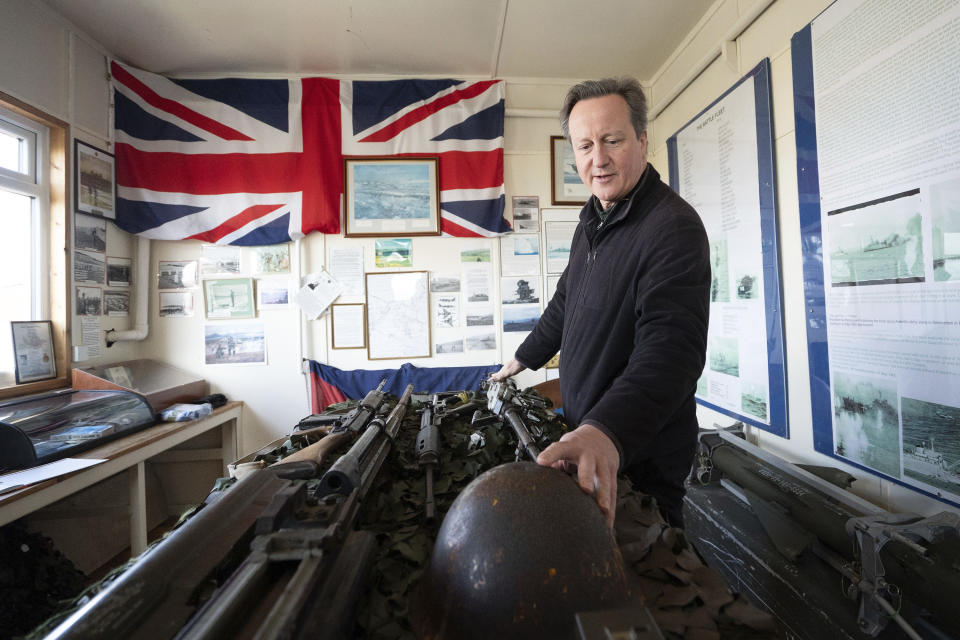 Foreign Secretary Lord David Cameron visits a museum in Goose Green on the Falkland Islands, during his high-profile visit to demonstrate they are a "valued part of the British family" amid renewed Argentinian calls for talks on their future, in Stanley, Falkland Islands, Britain, on Monday Feb. 19, 2024. (Stefan Rousseau/PA via AP)