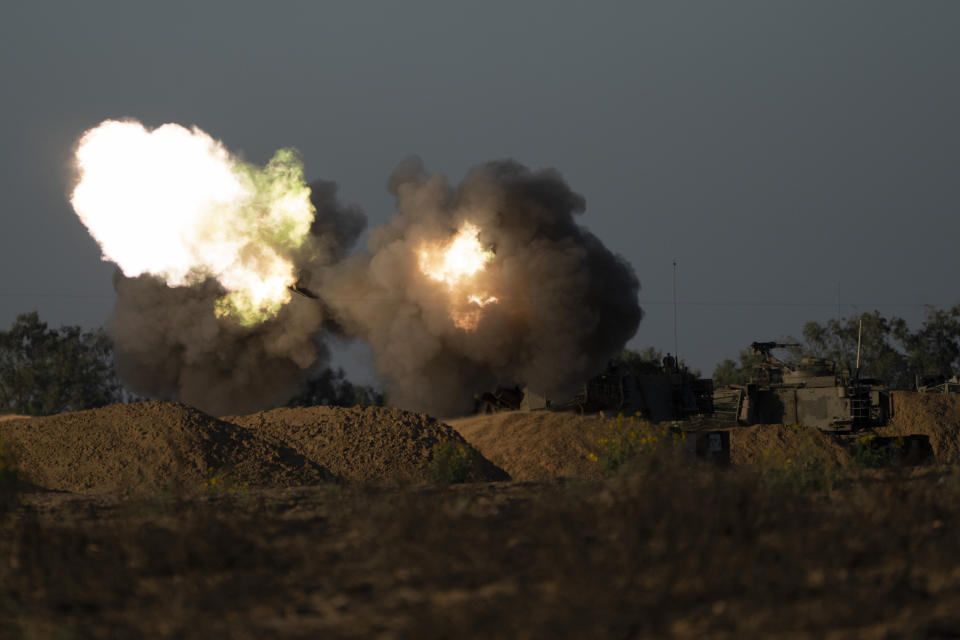 An Israeli mobile artillery unit fires a shell from southern Israel towards the Gaza Strip, in a position near the Israel-Gaza border, Tuesday, May 7, 2024. (AP Photo/Leo Correa)