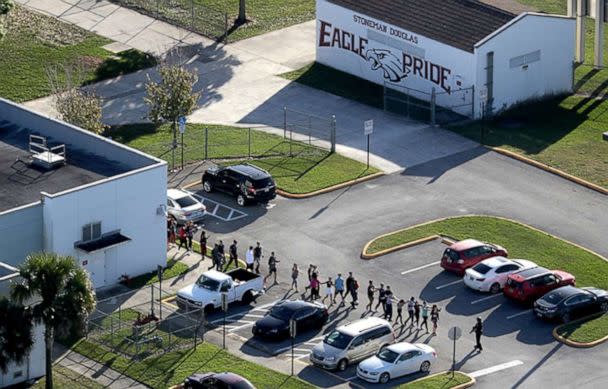 PHOTO: Students are evacuated by police out of Marjory Stoneman Douglas High School in Parkland, Fla., after a shooting on Wednesday, Feb. 14, 2018.  (Sun Sentinel/Tribune News Service via Getty Images)