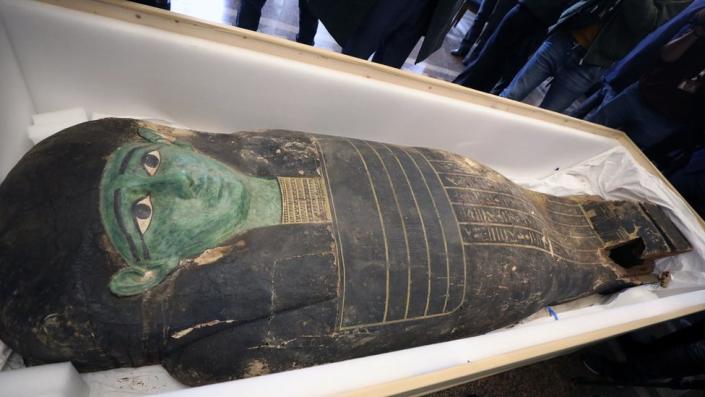 The looted &quot;Green Coffin&quot; on display in Cairo following its return by the US (2 January 2023)