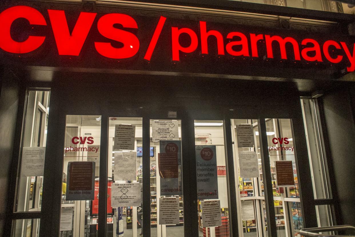 Bill Tompkins/Getty Images Signage on CVS Pharmacy front doors due to the coronavirus COVID-19 pandemic on March 25, 2020 in New York City.