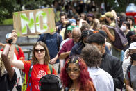 Protesters gather outside Atlanta City Hall ahead of a council vote over whether to approve public funding for the construction of a proposed police and firefighter training center, Monday, June 5, 2023. (Arvin Temkar/Atlanta Journal-Constitution via AP)