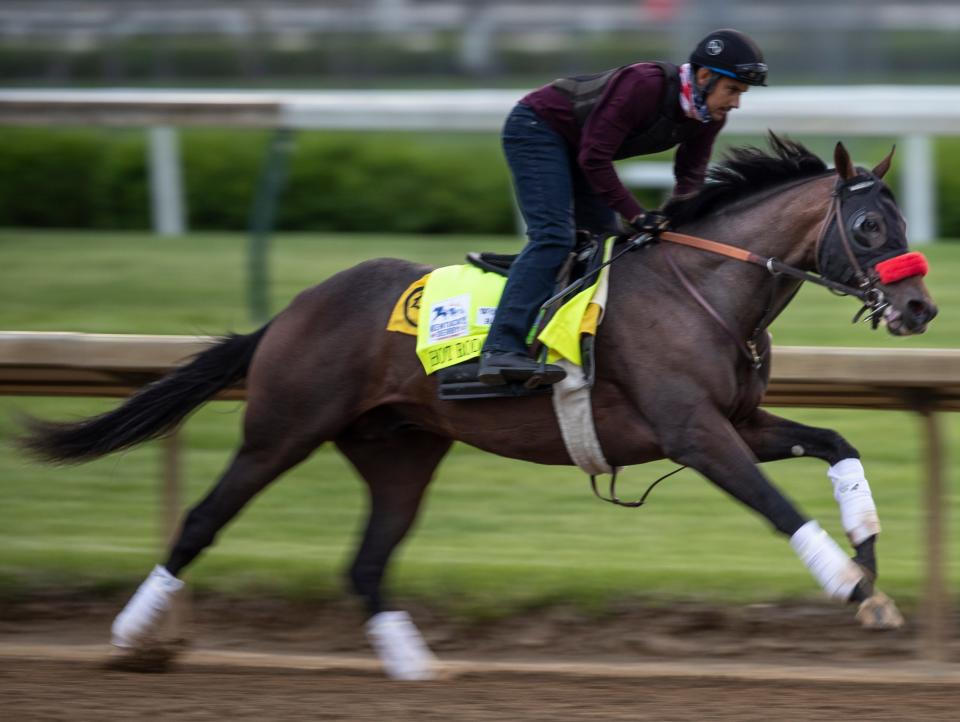 Kentucky Derby entrant Hot Rod Charlie gallops around the track during a morning workout at Churchill Downs April 28, 2021